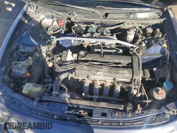 1998 Acura Integra LS with VIN JH4DC445XWS015414, listed as a Copart auction lot 82069724 with 69,420 mi miles and Salvage title. Bid and sale history available at DreamBid. Image 13.