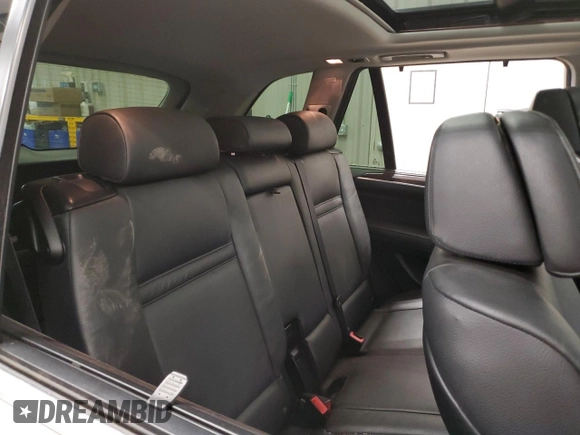 2013 BMW X5 xDrive35i z VIN 5UXZV4C5XD0B23352, wystawiony jako Copart lot #57481655 z przebiegiem 126 891 mil mil oraz Szkody całkowita. Historia ofert i sprzedaży dostępna na DreamBid. Obrazek 10.