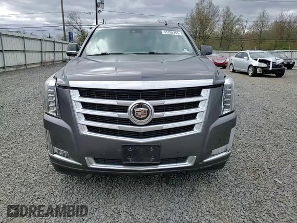2015 Cadillac Escalade Luxury z VIN 1GYS4BKJXFR238094, wystawiony jako Copart lot #53188355 z przebiegiem Nie podano mil oraz Szkody całkowita. Historia ofert i sprzedaży dostępna na DreamBid. Obrazek 11.