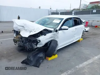 2014 Volkswagen Passat S z VIN 1VWAT7A30EC113737, wystawiony jako IAAI lot #42029001 z przebiegiem 115 378 mil mil oraz . Historia ofert i sprzedaży dostępna na DreamBid. Obrazek 18.
