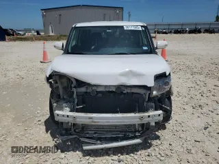 2013 Scion xB z VIN JTLZE4FE2DJ033668, wystawiony jako Copart lot #56171585 z przebiegiem 117 646 mil mil oraz Szkody całkowita. Historia ofert i sprzedaży dostępna na DreamBid. Obrazek 5.