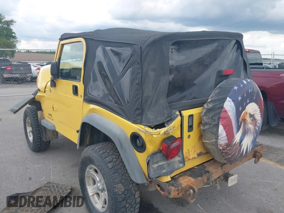 2005 Jeep Wrangler SE z VIN 1J4FA29S95P373313, wystawiony jako IAAI lot #42340611 z przebiegiem 162 801 mil mil oraz . Historia ofert i sprzedaży dostępna na DreamBid. Obrazek 3.