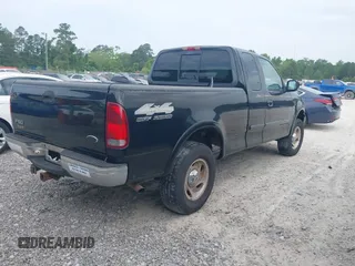 2000 Ford F-150 XL with VIN 1FTRX18LXYNB58643, listed as a IAAI auction lot 42100553 with 382,492 mi miles. Bid and sale history available at carsss.com. Image 4.