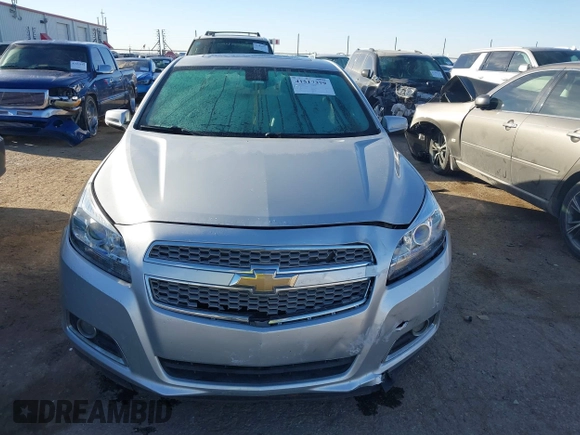 2013 Chevrolet Malibu LTZ with VIN 1G11H5SA7DU138464, listed as a IAAI auction lot 41517379 with 116,430 mi miles and . Bid and sale history available at DreamBid. Image 12.