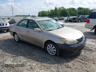 2004 Toyota Camry LE with VIN 4T1BF30K24U570599, listed as a IAAI auction lot 42107715 with 324,191 mi miles and . Bid and sale history available at DreamBid. Image 1.