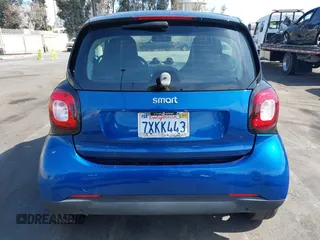2016 Smart fortwo Passion z VIN WMEFJ5DA4GK067126, wystawiony jako IAAI lot #41559385 z przebiegiem 79 540 mil mil oraz . Historia ofert i sprzedaży dostępna na DreamBid. Obrazek 13.