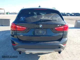 2018 BMW X1 sDrive28i with VIN WBXHU7C37J5H43318, listed as a IAAI auction lot 41294730 with 73,600 mi miles. Bid and sale history available at carsss.com. Image 16.