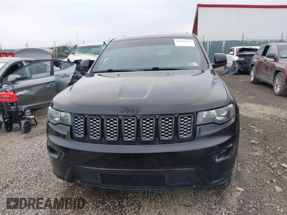 2017 Jeep Grand Cherokee Laredo with VIN 1C4RJFAG9HC882251, listed as a IAAI auction lot 41696710 with 129,627 mi miles and . Bid and sale history available at DreamBid. Image 12.
