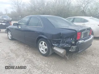 2000 Lincoln LS with VIN 1LNHM87A6YY879355, listed as a IAAI auction lot 41917760 with 70,457 mi miles. Bid and sale history available at carsss.com. Image 3.