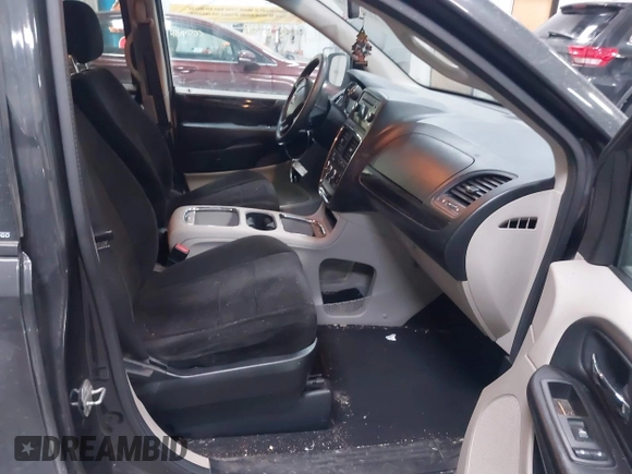 2012 Dodge Grand Caravan SXT with VIN 2C4RDGCG7CR358266, listed as a IAAI auction lot 41582428 with 169,137 mi miles and . Bid and sale history available at DreamBid. Image 5.