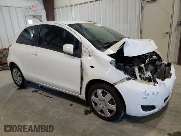 2011 Toyota Yaris with VIN JTDJT4K30B5334173, listed as a Copart auction lot 87031624 with 179,280 mi miles and Salvage Title. Bid and sale history available at carsss.com. Image 4.