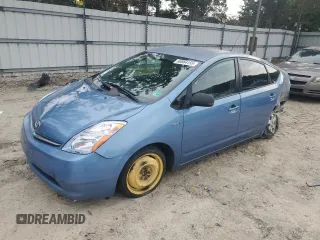 2007 Toyota Prius z VIN JTDKB20U877637138, wystawiony jako Copart lot #60864155 z przebiegiem 263 797 mil mil oraz Czysty tytuł • Clean title. Historia ofert i sprzedaży dostępna na DreamBid. Obrazek 1.