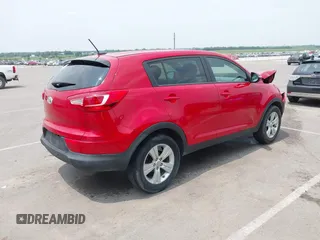 2013 Kia Sportage LX with VIN KNDPB3A24D7485007, listed as a IAAI auction lot 42446887 with 106,033 mi miles and . Bid and sale history available at DreamBid. Image 4.
