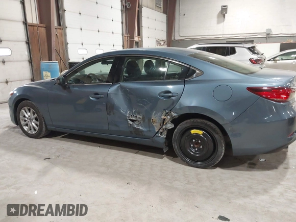 2014 Mazda 6 i Sport with VIN JM1GJ1U61E1148983, listed as a IAAI auction lot 41977553 with 100,668 mi miles and . Bid and sale history available at DreamBid. Image 6.