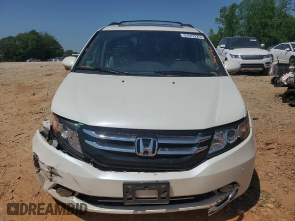 2016 Honda Odyssey Touring Elite with VIN 5FNRL5H94GB109829, listed as a Copart auction lot 52583225 with 70,740 mi miles and Salvage Title. Bid and sale history available at carsss.com. Image 5.