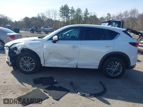 2017 Mazda CX-5 Touring z VIN JM3KFBCL8H0214052, wystawiony jako IAAI lot #41940783 z przebiegiem 120 083 mil mil oraz . Historia ofert i sprzedaży dostępna na DreamBid. Obrazek 13.