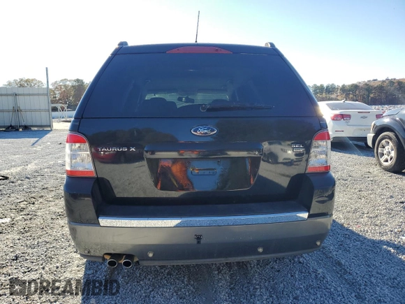 2008 Ford Taurus X SEL with VIN 1FMDK05W68GA33723, listed as a Copart auction lot 81121974 with 309,668 mi miles and Salvage Title. Bid and sale history available at DreamBid. Image 6.