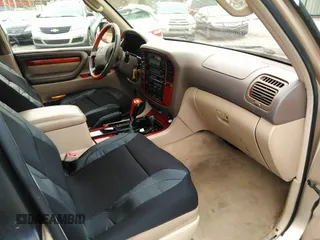 2000 Lexus LX 470 with VIN JT6HT00W8Y0100087, listed as a IAAI auction lot 41762294 with 274,720 mi miles and . Bid and sale history available at carsss.com. Image 5.