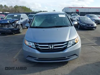 2017 Honda Odyssey EX-L with VIN 5FNRL5H64HB017661, listed as a IAAI auction lot 41719447 with 99,895 mi miles and . Bid and sale history available at DreamBid. Image 12.
