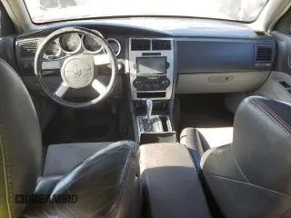 2006 Dodge Charger SRT-8 with VIN 2B3KA73W76H421802, listed as a Copart auction lot 83709404 with Not Provided miles and Salvage Title. Bid and sale history available at DreamBid. Image 8.