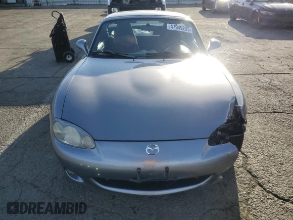 2002 Mazda MX-5 Miata Cloth with VIN JM1NB353X20228420, listed as a Copart auction lot 47949235 with 94,341 mi miles and Salvage title. Bid and sale history available at DreamBid. Image 5.