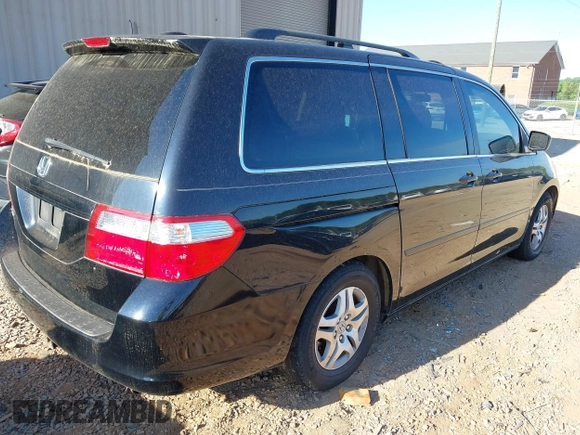 2007 Honda Odyssey EX-L with VIN 5FNRL387X7B030071, listed as a IAAI auction lot 42097074 with 231,624 mi miles. Bid and sale history available at carsss.com. Image 4.