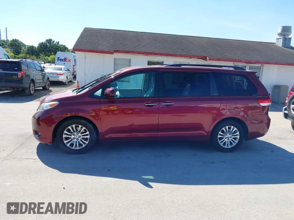 2012 Toyota Sienna XLE AAS with VIN 5TDYK3DC8CS258612, listed as a IAAI auction lot 41899311 with 75,779 mi miles and . Bid and sale history available at DreamBid. Image 14.