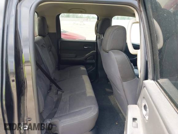 2022 Nissan Frontier SV with VIN 1N6ED1EJ2NN677012, listed as a IAAI auction lot 41967201 with 76,835 mi miles and . Bid and sale history available at DreamBid. Image 8.