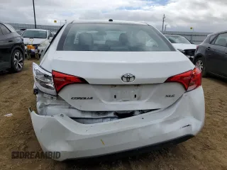 2019 Toyota Corolla L with VIN 5YFBURHE5KP891705, listed as a Copart auction lot 49501905 with 67,403 mi miles and Salvage Title. Bid and sale history available at DreamBid. Image 6.