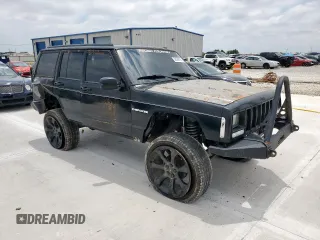 1998 Jeep Cherokee Sport z VIN 1J4FJ68S8WL193483, wystawiony jako Copart lot #58368705 z przebiegiem 94 462 mil mil oraz Szkoda całkowita • Salvage title. Historia ofert i sprzedaży dostępna na DreamBid. Obrazek 4.