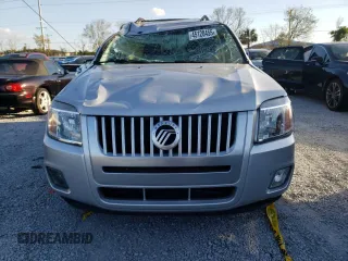 2009 Mercury Mariner Premier z VIN 4M2CU87789KJ23933, wystawiony jako Copart lot #45120455 z przebiegiem 104 465 mil mil oraz Szkody całkowita. Historia ofert i sprzedaży dostępna na DreamBid. Obrazek 5.