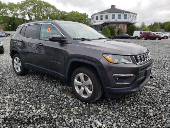 2020 Jeep Compass Latitude with VIN 3C4NJDBB2LT228128, listed as a Copart auction lot 57214605 with 46,218 mi miles and Salvage title. Bid and sale history available at DreamBid. Image 4.