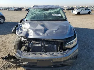 2022 Volkswagen Tiguan S with VIN 3VV1B7AX3NM156591, listed as a Copart auction lot 83825494 with 16,572 mi miles and Salvage Title. Bid and sale history available at carsss.com. Image 5.