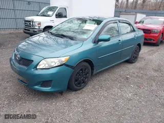 2010 Toyota Corolla with VIN 2T1BU4EE9AC297222, listed as a IAAI auction lot 41968921 with 128,319 mi miles. Bid and sale history available at carsss.com. Image 2.