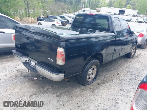 2000 Ford F-150 XL with VIN 1FTZX1723YNB84512, listed as a IAAI auction lot 41966003 with 1 mi miles. Bid and sale history available at carsss.com. Image 4.