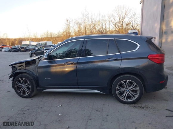 2017 BMW X1 xDrive28i with VIN WBXHT3C33H5F87591, listed as a IAAI auction lot 41256899 with 69,362 mi miles. Bid and sale history available at carsss.com. Image 14.
