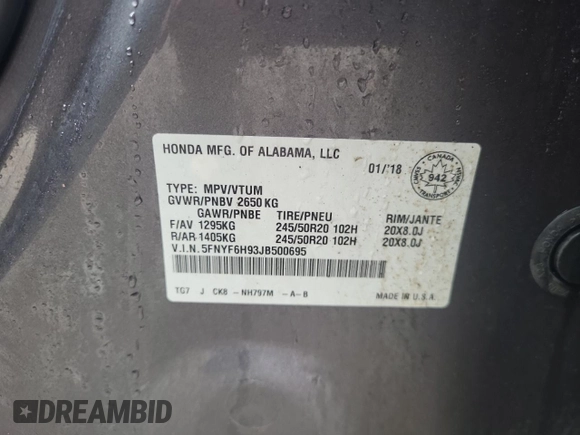 2018 Honda Pilot Touring z VIN 5FNYF6H93JB500695, wystawiony jako Copart lot #83302284 z przebiegiem 12 086 mil mil oraz Szkoda całkowita • Salvage title. Historia ofert i sprzedaży dostępna na DreamBid. Obrazek 13.