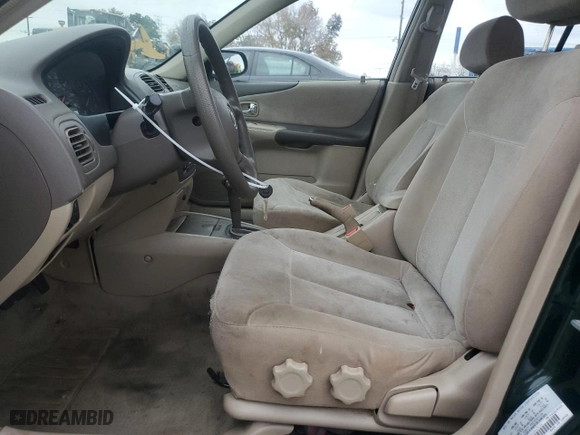 2001 Mazda Protege DX with VIN JM1BJ222010447414, listed as a Copart auction lot 81344584 with 195,931 mi miles and Salvage Title. Bid and sale history available at carsss.com. Image 7.