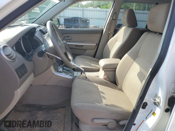 2010 Suzuki Grand Vitara Premium z VIN JS3TD0D24A4100983, wystawiony jako Copart lot #60311295 z przebiegiem 104 455 mil mil oraz Szkoda całkowita • Salvage title. Historia ofert i sprzedaży dostępna na DreamBid. Obrazek 7.