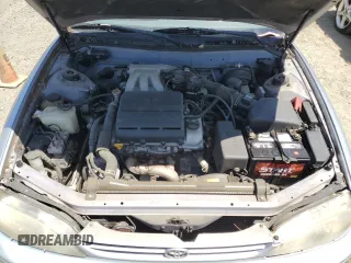 1995 Toyota Camry z VIN 4T1GK12C7SU099655, wystawiony jako Copart lot #58421895 z przebiegiem 89 299 mil mil oraz Czysty tytuł • Clean title. Historia ofert i sprzedaży dostępna na DreamBid. Obrazek 11.