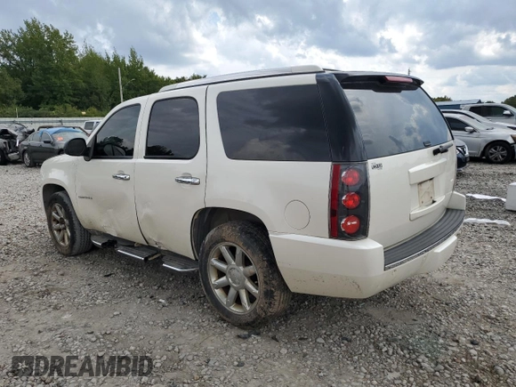 2011 GMC Yukon Denali with VIN 1GKS1EEFXBR313625, listed as a Copart auction lot 72634294 with 129,834 mi miles and Salvage Title. Bid and sale history available at carsss.com. Image 2.