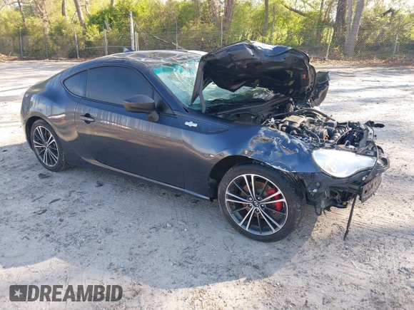 2015 Scion FR-S with VIN JF1ZNAA10F8707671, listed as a IAAI auction lot 42000130 with 136,734 mi miles. Bid and sale history available at carsss.com. Image 1.