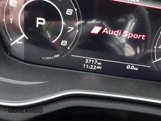 2023 Audi RS 5 z VIN WUANWAF55PA902356, wystawiony jako IAAI lot #41034121 z przebiegiem 3 717 mil mil oraz . Historia ofert i sprzedaży dostępna na DreamBid. Obrazek 14.