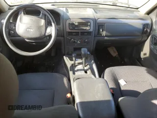 2004 Jeep Grand Cherokee Laredo with VIN 1J4GW48S34C307347, listed as a Copart auction lot 55749565 with Not provided miles and Salvage title. Bid and sale history available at DreamBid. Image 8.