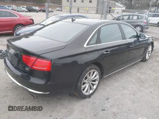 2011 Audi A8 z VIN WAURVAFDXBN026102, wystawiony jako IAAI lot #39096660 z przebiegiem 151 060 mil mil oraz . Historia ofert i sprzedaży dostępna na DreamBid. Obrazek 4.