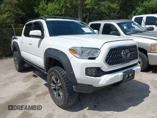 2019 Toyota Tacoma SR with VIN 5TFAX5GN7KX140717, listed as a IAAI auction lot 42757878 with 59,381 mi miles and . Bid and sale history available at DreamBid. Image 1.