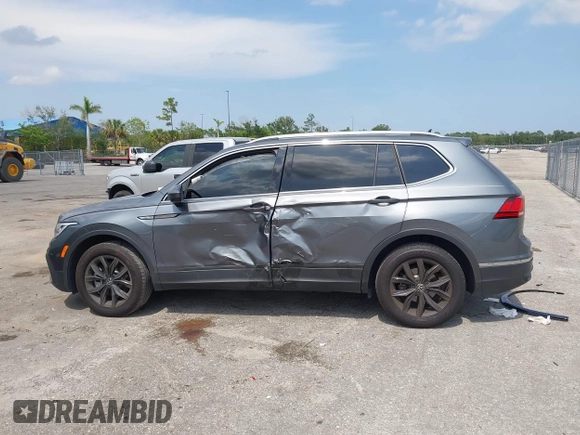 2024 Volkswagen Tiguan SE with VIN 3VVNB7AX4RM138429, listed as a IAAI auction lot 42303215 with Not provided miles and . Bid and sale history available at DreamBid. Image 14.