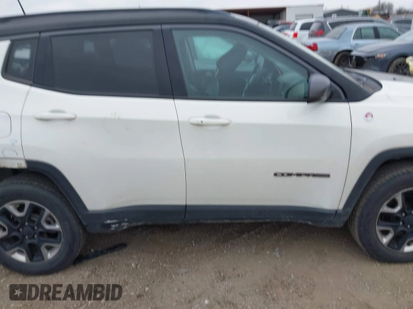 2018 Jeep Compass Trailhawk with VIN 3C4NJDDB7JT144431, listed as a IAAI auction lot 41629703 with 122,079 mi miles and . Bid and sale history available at carsss.com. Image 13.