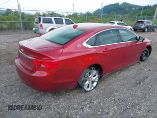 2014 Chevrolet Impala LT with VIN 1G1115SL7EU143042, listed as a IAAI auction lot 42445383 with 57,457 mi miles and . Bid and sale history available at DreamBid. Image 4.