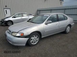 1999 Nissan Altima XE z VIN 1N4DL01D1XC202466, wystawiony jako Copart lot #54548015 z przebiegiem 131 409 mil mil oraz Szkoda całkowita • Salvage title. Historia ofert i sprzedaży dostępna na DreamBid. Obrazek 1.